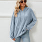 Pull tricoté à capuche et à rayures avec poche kangourou