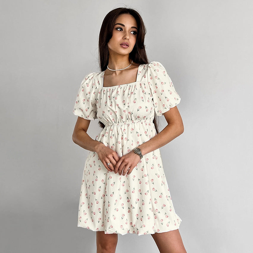 Robe élégante à manches bouffantes et à fleurs françaises
