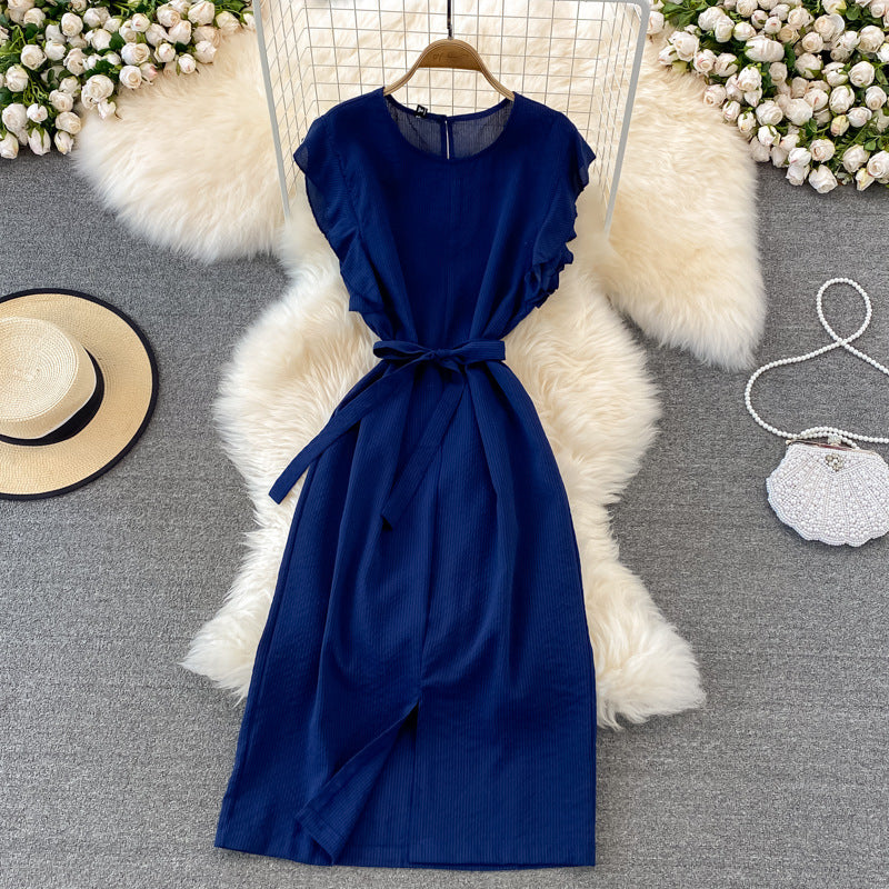 Refined Preppy-style Lady With An Elegant Feminine Look Adorned With Ruffled Cuffs