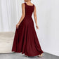 The Woman Is Wearing A Sleeveless Solid-color Dress