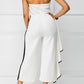 Pantalon large à une épaule