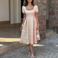 Elegant High-waisted A-line Dress With Puff Sleeves That Create A Slimming Elongating Look
