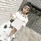 Girl's T-shirt with embroidered suspender