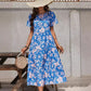 Robe élégante à volants multicouches et à grandes fleurs pour femme