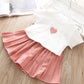 Two piece vest and skirt suit