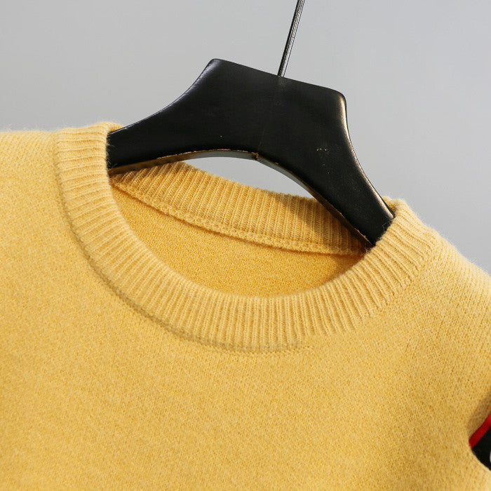 Turtleneck sweater letter holes