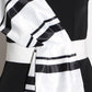 Striped jumpsuit with suspenders and bow