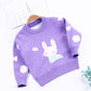 Le pull en tricot ne se décolore pas, j'adore le double manteau lapin blanc