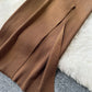 A Two-piece Knitted Vest With A Slimming, Body-hugging, Slit Skirt