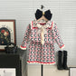 Ensemble deux pièces pull et cardigan tricoté pour enfant