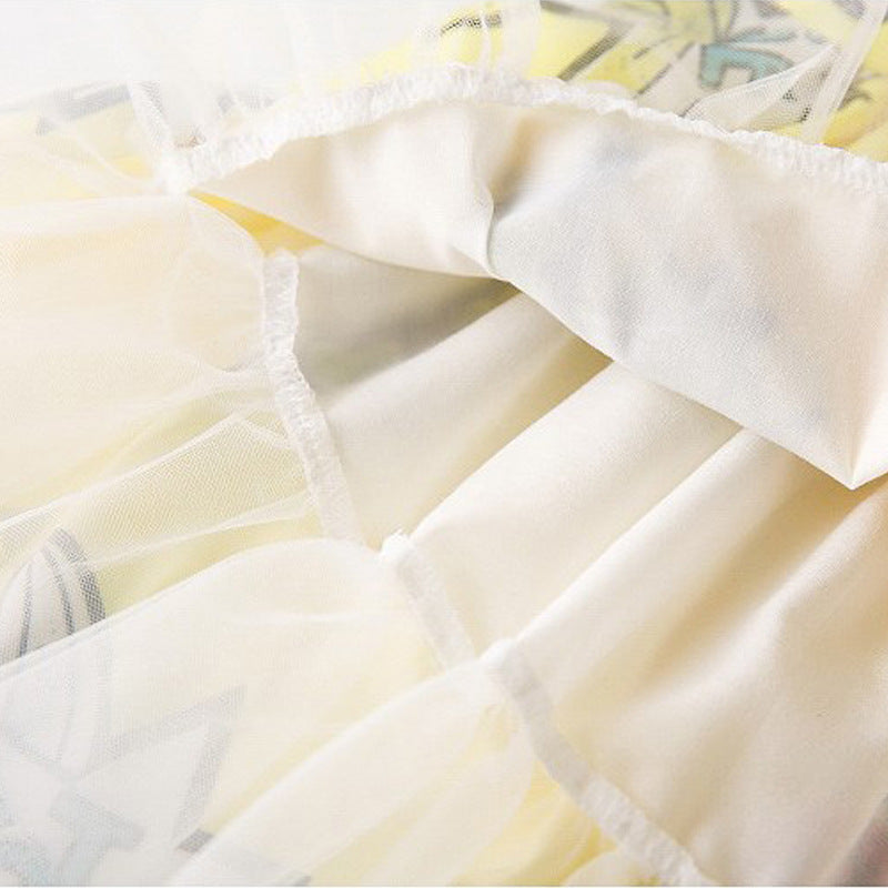 Robe fille avec jupe en gaze jaune à gros nœud