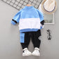 Nouveau costume pour enfants printemps et automne coréen hommes et femmes enfants sport lettre costume couture manches longues deux pièces costume marée