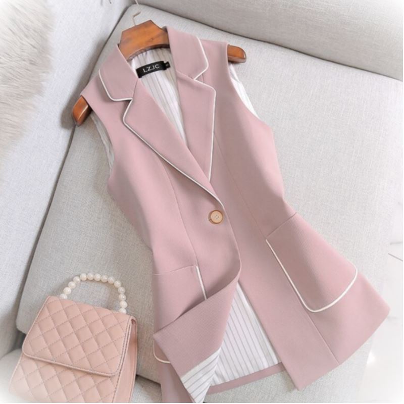 Little Girl In Pink Suit Waistcoat With White Striped Coat
