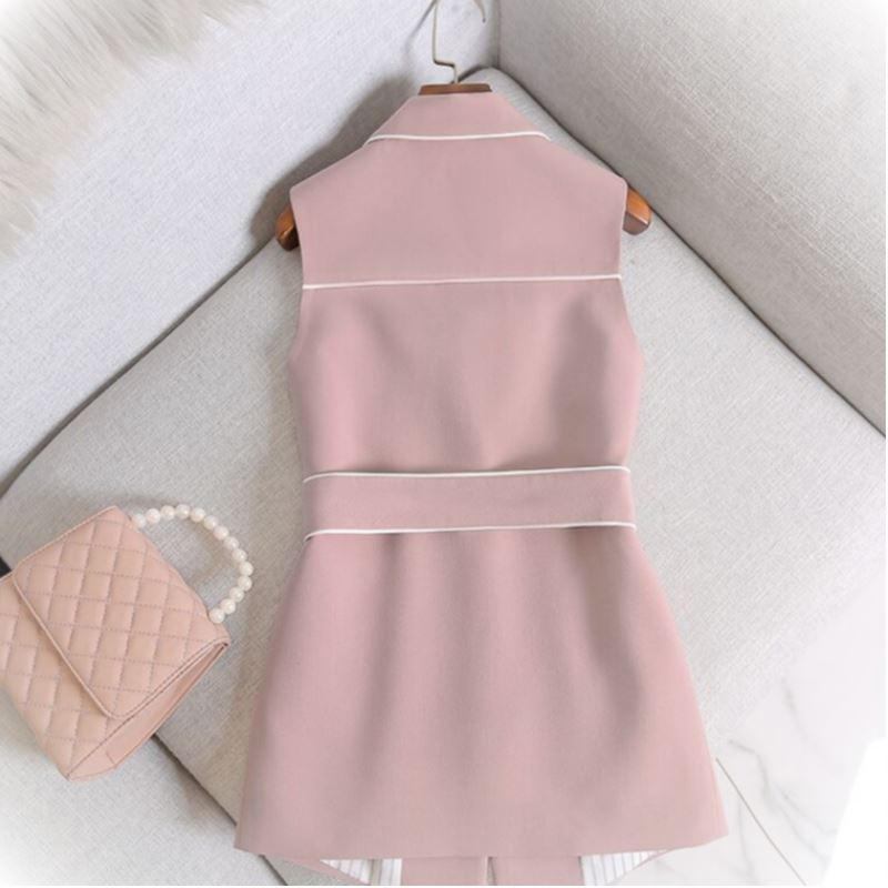 Little Girl In Pink Suit Waistcoat With White Striped Coat