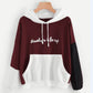 Pull à capuche aux couleurs explosives assorties pour femme