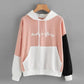 Pull à capuche aux couleurs explosives assorties pour femme
