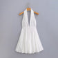 Robe à col suspendu brodé creux, jupe dos nu