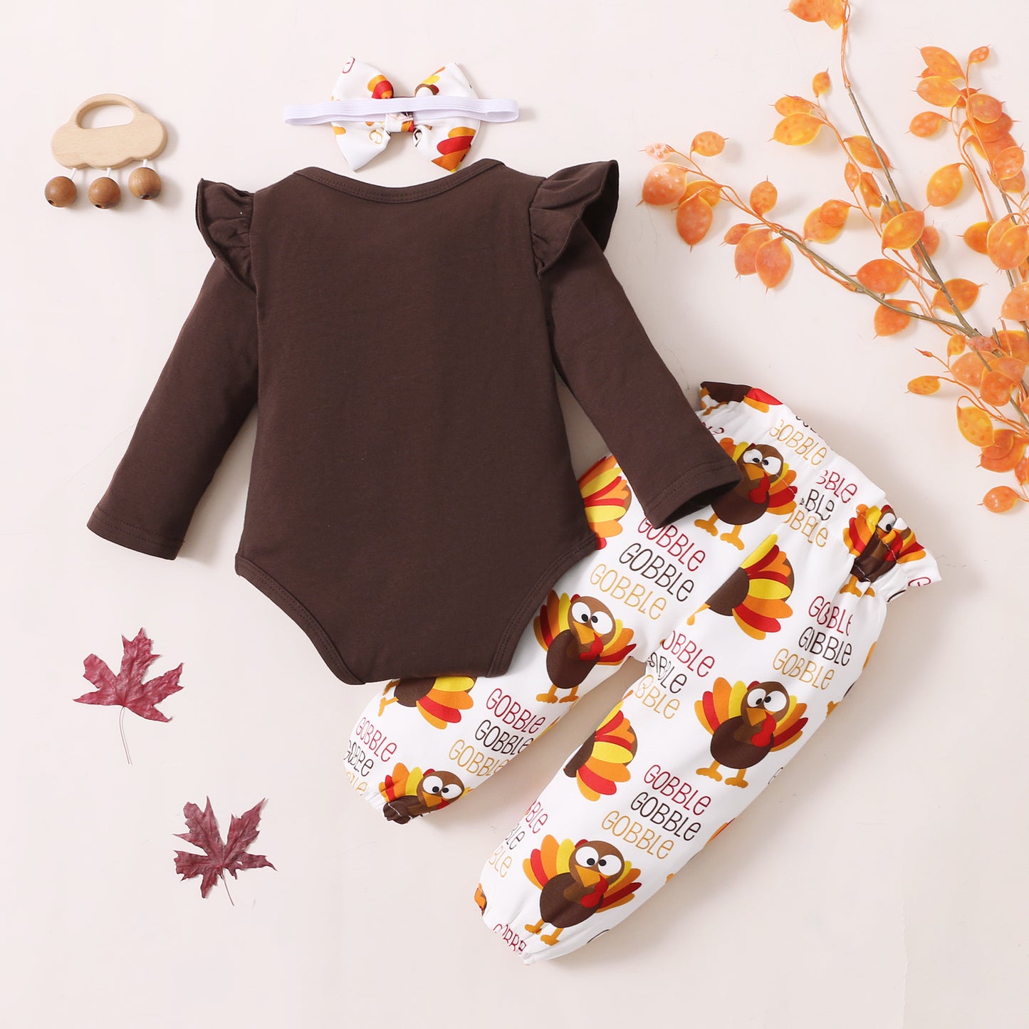 Combinaison tricotée avec pantalon imprimé dinde