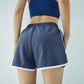 Short de sport taille haute pour femme
