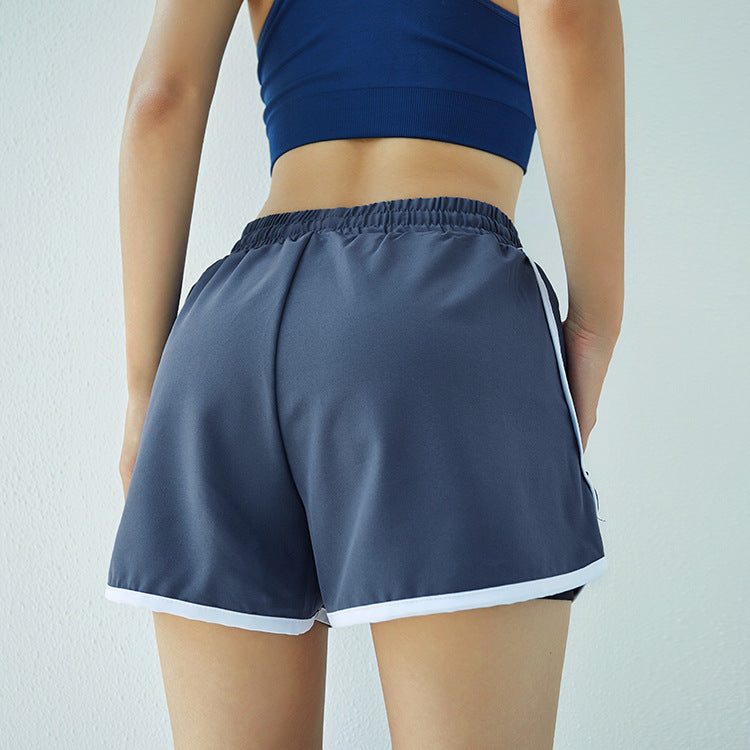Short de sport taille haute pour femme
