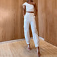 Pantalon skinny court à épaules dénudées et poches pour femme