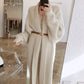 Women's Loose Fitting Knee Length Warm Jacket With Long Sleeves