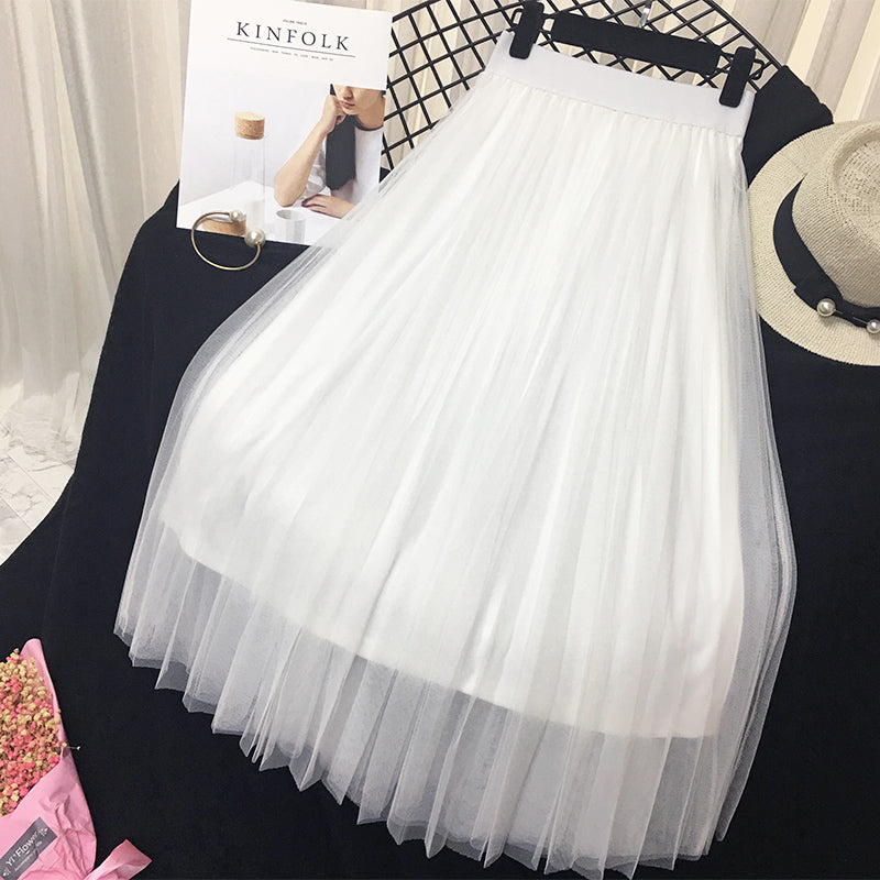 Women's solid color pleated skirt