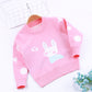 Le pull en tricot ne se décolore pas, j'adore le double manteau lapin blanc