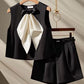 Two-piece Set Featuring A Black Bow-tie Top And Shorts