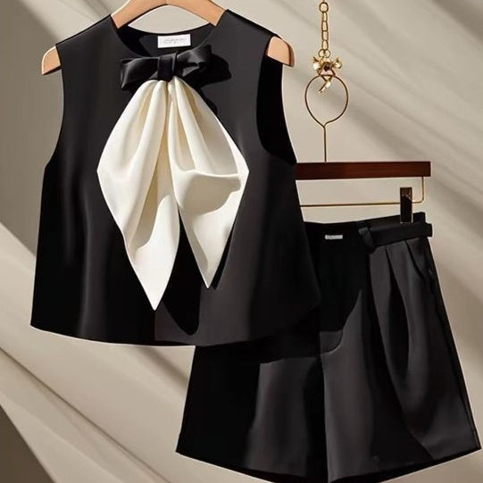 Two-piece Set Featuring A Black Bow-tie Top And Shorts