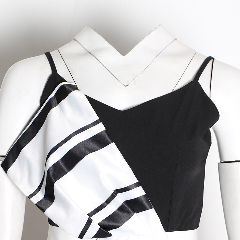 Striped jumpsuit with suspenders and bow