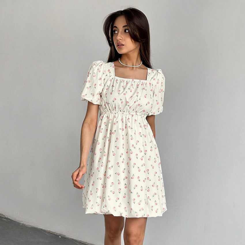 Robe élégante à manches bouffantes et à fleurs françaises