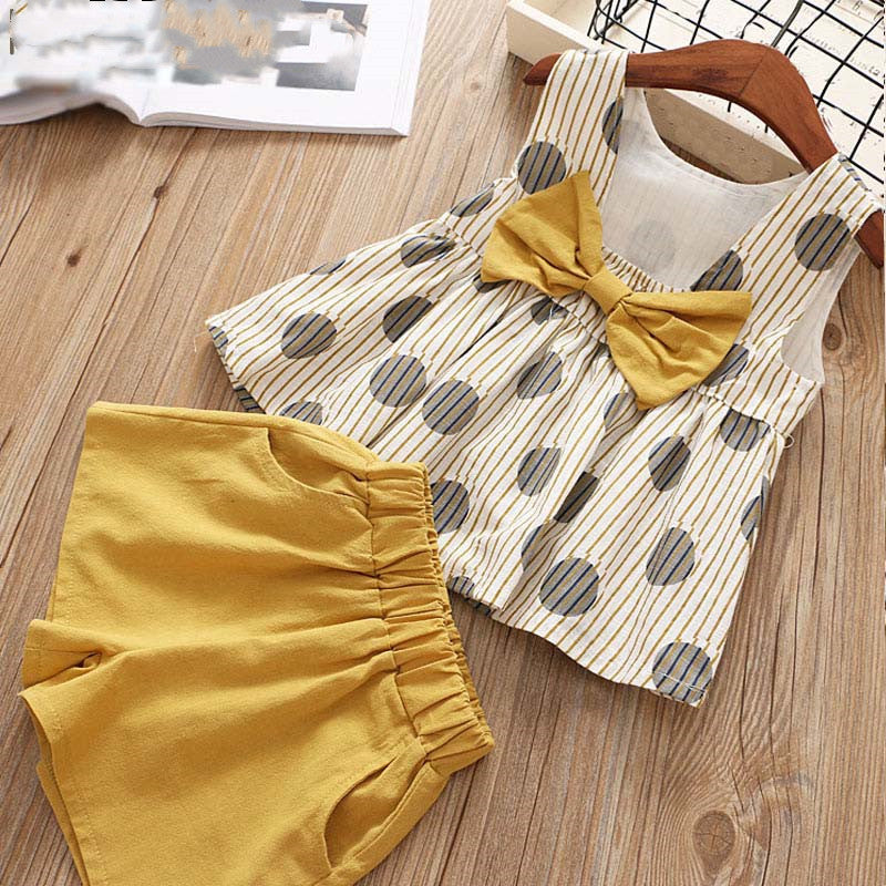 Two piece vest and skirt suit