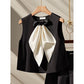 Two-piece Set Featuring A Black Bow-tie Top And Shorts