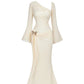 Flared Sleeves With A Butterfly-clasp Design Create A Slimming Ruched Look