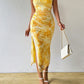 Printed High Waisted Figure Hugging Wrap Skirt With A Slit And A Strapless Design