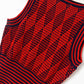 Pull taille haute à col en V croisé et losanges