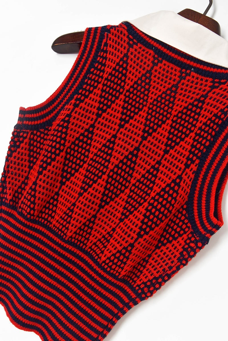 Pull taille haute à col en V croisé et losanges