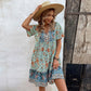 Robe de vacances bohème décontractée et ample à col en V et à petites fleurs, style européen et américain