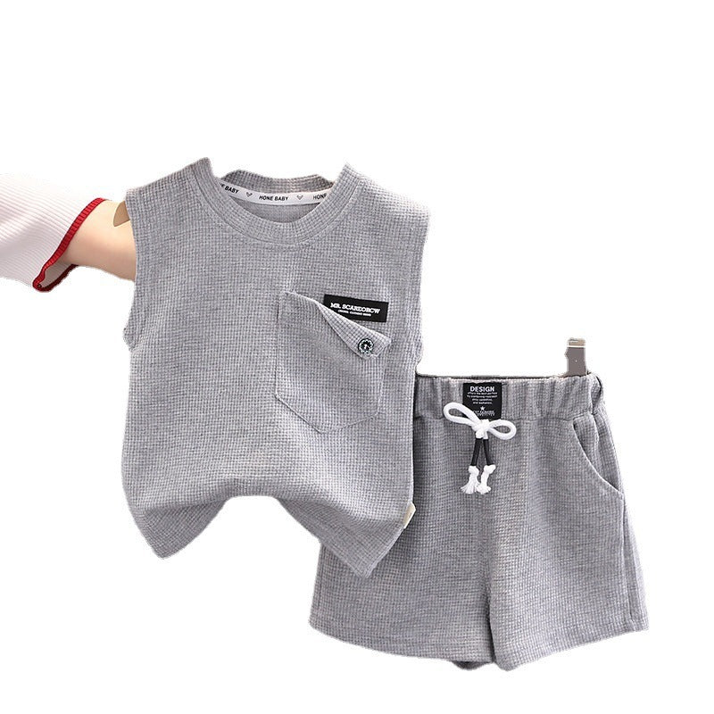 Gilet sans manches à poches de couleur unie pour garçon