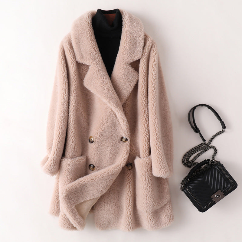 Manteau mi-long ample en laine de mouton pour femme