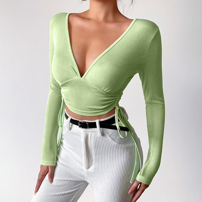 Short Cross  Drawstring Reveals Chest And Long Sleeves
