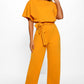 Short sleeve women's jumpsuit with lace button