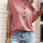 T-shirt à manches courtes et boutons de couleur unie pour femme