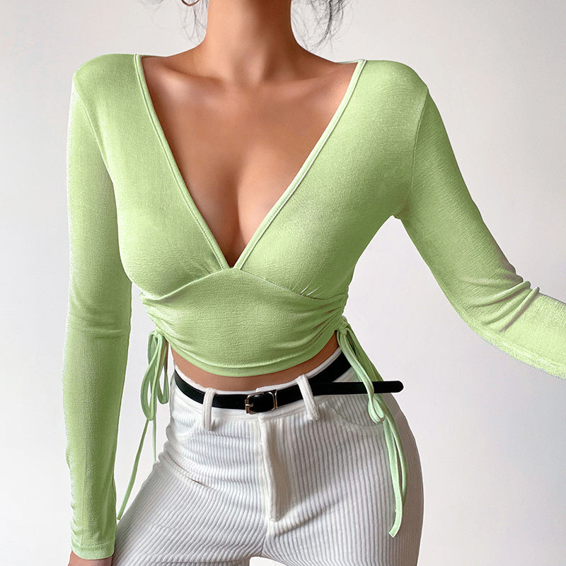 Short Cross  Drawstring Reveals Chest And Long Sleeves