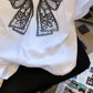 Nouveau t-shirt à manches courtes imprimé nœud papillon pour femme