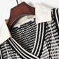 Pull taille haute à col en V croisé et losanges