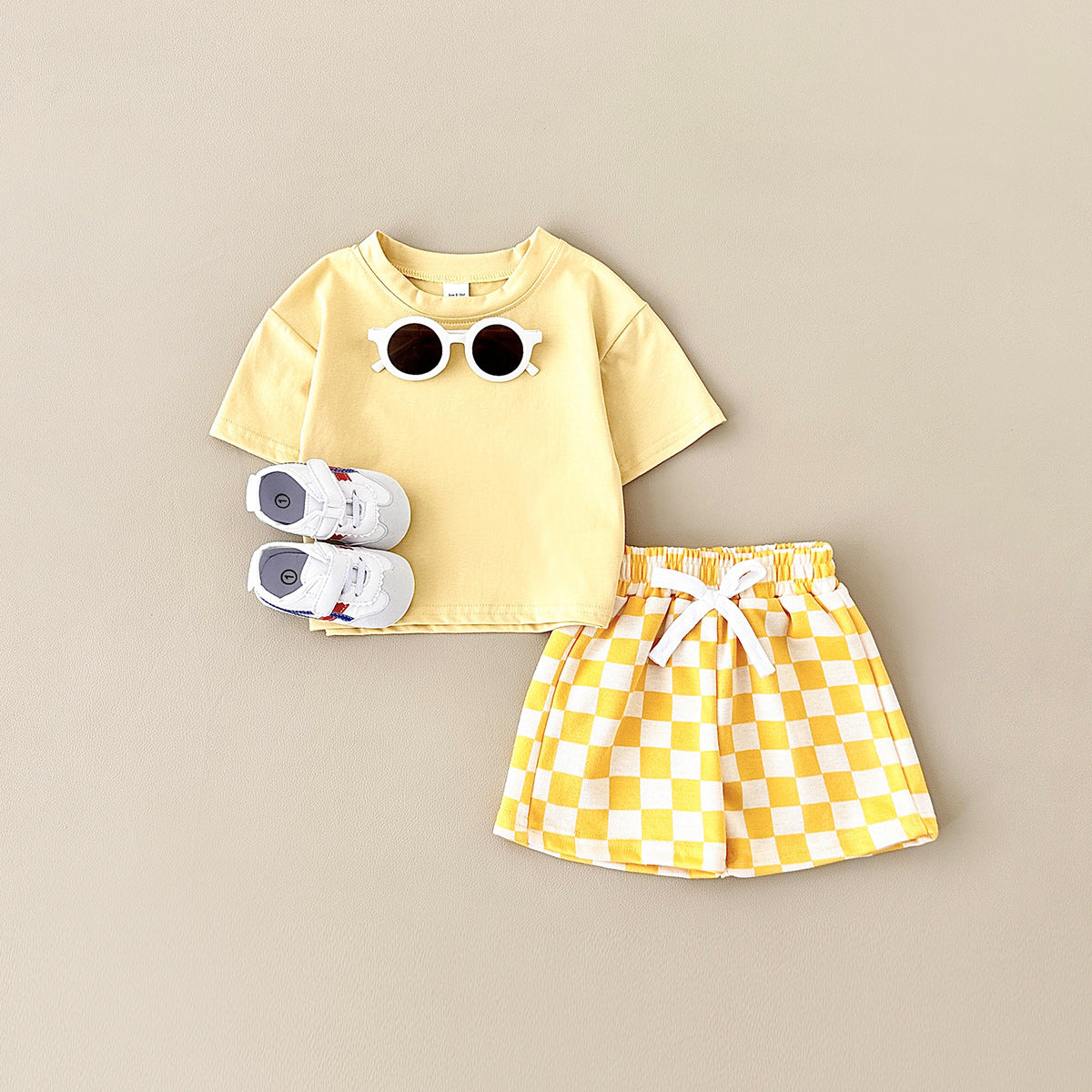 Ensemble deux pièces pantalon à carreaux et motif damier pour enfant