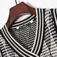 Pull taille haute à col en V croisé et losanges