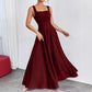 The Woman Is Wearing A Sleeveless Solid-color Dress